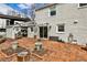 Charming backyard features a brick patio, a covered area, and access to the home at 800 Glenairy Dr, Atlanta, GA 30328