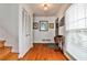 Entryway featuring hardwood floors, a closet, and a decorative table, offering functionality and style at 800 Glenairy Dr, Atlanta, GA 30328
