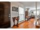 Entryway showcasing hardwood floors, decorative furnishings, and a modern door, exuding a welcoming ambiance at 800 Glenairy Dr, Atlanta, GA 30328