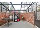 Brick-walled greenhouse provides a dedicated space for gardening and plant cultivation at 800 Glenairy Dr, Atlanta, GA 30328