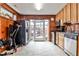 Well-lit kitchen with stainless steel appliances and a view of the brick-paved outdoor patio at 800 Glenairy Dr, Atlanta, GA 30328