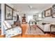Spacious living room with hardwood floors, abundant decor, and natural light, creating an inviting atmosphere at 800 Glenairy Dr, Atlanta, GA 30328