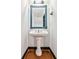Charming bathroom features a pedestal sink and classic fixtures at 1261 Caroline St # 211, Atlanta, GA 30307