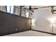 Bedroom featuring exposed beams, ceiling fan, and neutral walls and floor at 1261 Caroline St # 211, Atlanta, GA 30307