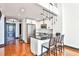 Open kitchen with granite countertops, stainless steel appliances, and island seating at 1261 Caroline St # 211, Atlanta, GA 30307
