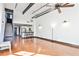 Spacious living room with hardwood floors, modern lighting, and an open layout at 1261 Caroline St # 211, Atlanta, GA 30307