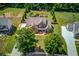 Expansive aerial view showcasing the home's mature landscaping and large lot in a serene setting at 1433 Henderson Ridge Ln, Loganville, GA 30052