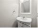 Clean, minimalist half-bath with modern sink and fixtures at 2003 Queen Anne Ct, Sandy Springs, GA 30350