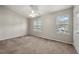 Bright bedroom with large windows and neutral paint at 2003 Queen Anne Ct, Sandy Springs, GA 30350