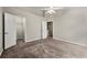 Bedroom with closet doors and neutral carpeting at 2003 Queen Anne Ct, Sandy Springs, GA 30350