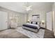 Serene bedroom with large window, soft lighting, and neutral tones at 2003 Queen Anne Ct, Sandy Springs, GA 30350