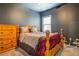 Comfortable bedroom featuring a large bed and natural light from the window at 117 Jacobs Ln, Loganville, GA 30052