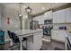 Kitchen featuring granite countertops, stainless steel appliances and a breakfast bar at 117 Jacobs Ln, Loganville, GA 30052