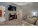 Cozy main bedroom with a TV and sitting area for comfort and entertainment at 117 Jacobs Ln, Loganville, GA 30052