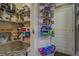Organized pantry featuring shelving and door racks for efficient storage of food and supplies at 117 Jacobs Ln, Loganville, GA 30052