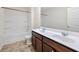 Bathroom featuring double sinks, wood cabinets and a shower-tub combo at 1468 Harlequin Way, Stockbridge, GA 30281