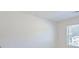 Bedroom with hardwood floors, a window with blinds, and white walls ready for personalization at 1468 Harlequin Way, Stockbridge, GA 30281