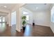 Bright living room with hardwood floors, neutral paint, and plenty of natural light at 1468 Harlequin Way, Stockbridge, GA 30281