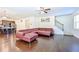 Inviting living room with hardwood floors and open access to the kitchen area at 1468 Harlequin Way, Stockbridge, GA 30281