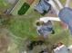 Overhead view showcasing the property's layout, manicured landscaping, and location within the neighborhood at 403 Tea Olive Ct, Canton, GA 30115
