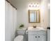 Cozy bathroom with shower and tub combo and stylish fixtures at 403 Tea Olive Ct, Canton, GA 30115