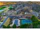 Aerial view of community amenities featuring a pool, tennis court, and surrounding residential area at 403 Tea Olive Ct, Canton, GA 30115