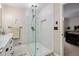 This beautifully remodeled bathroom features a glass-enclosed shower with built-in niche at 3003 Hanover Se Ln, Conyers, GA 30094