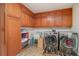 Fully equipped laundry room with modern washer and dryer, upper and lower cabinets, and a sink at 3003 Hanover Se Ln, Conyers, GA 30094