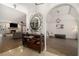 A view of an open-concept living room with a fireplace and seamless flow to the dining area at 3003 Hanover Se Ln, Conyers, GA 30094