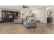 Spacious living room offers ample seating, built in shelving, and neutral decor at 3003 Hanover Se Ln, Conyers, GA 30094