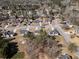 Beautiful neighborhood aerial showcasing homes with well-maintained landscaping and tree-lined streets at 9630 Carolina Drive, Jonesboro, GA 30238