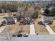 An aerial view of a lovely two-story brick home in a well-kept neighborhood at 9630 Carolina Drive, Jonesboro, GA 30238