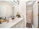 Bathroom with a single sink vanity and a shower/tub combo at 9630 Carolina Drive, Jonesboro, GA 30238