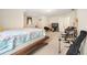 Spacious bedroom featuring two twin beds, a drum set and a flat screen TV at 9630 Carolina Drive, Jonesboro, GA 30238