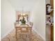 Bright dining room with a chandelier and a window that provides plenty of natural light at 9630 Carolina Drive, Jonesboro, GA 30238