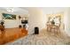 View of the living room and eat-in kitchen, highlighting the open floor plan and hardwood floors at 9630 Carolina Drive, Jonesboro, GA 30238