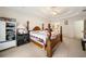Relaxing bedroom with tray ceilings, soft carpet, and a spacious layout for comfortable living at 9630 Carolina Drive, Jonesboro, GA 30238