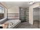 Bathroom featuring soaking tub, tiled walls, and walk-in shower with a glass door at 1964 Hollywood Nw Rd, Atlanta, GA 30318