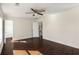 Bedroom with hardwood floors, windows, and a ceiling fan at 1964 Hollywood Nw Rd, Atlanta, GA 30318