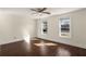 Bedroom with hardwood floors, windows, and a ceiling fan at 1964 Hollywood Nw Rd, Atlanta, GA 30318