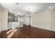 Open-concept living room flows into a kitchen with a large counter and stainless appliances at 1964 Hollywood Nw Rd, Atlanta, GA 30318