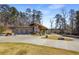 Wide angle shot of a modern park building with stone accents and wooded surroundings at 1964 Hollywood Nw Rd, Atlanta, GA 30318