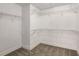 Walk-in closet with white walls, carpet, and open, wire shelving at 1964 Hollywood Nw Rd, Atlanta, GA 30318