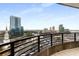 Balcony offers expansive city views, showcasing skyscrapers, landmarks, and the urban landscape at 750 Park Ne Ave # 19E, Atlanta, GA 30326