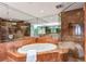Luxurious bathroom with a glass-enclosed shower, a soaking tub, and upscale marble finishes for a spa-like experience at 750 Park Ne Ave # 19E, Atlanta, GA 30326