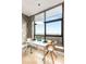 Charming breakfast nook by a large window with scenic views, providing a cozy spot for morning meals at 750 Park Ne Ave # 19E, Atlanta, GA 30326