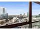 Expansive city view from a window, showcasing skyscrapers and the bustling urban landscape at 750 Park Ne Ave # 19E, Atlanta, GA 30326