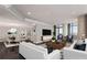 Open concept living room and dining area with hardwood floors and modern decor, offering a great space at 750 Park Ne Ave # 19E, Atlanta, GA 30326