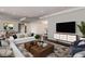 Open concept living room and dining area with hardwood floors and modern decor, offering a great space at 750 Park Ne Ave # 19E, Atlanta, GA 30326