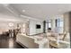 Open floor plan showing living and dining areas with dark floors and contemporary furnishings at 750 Park Ne Ave # 19E, Atlanta, GA 30326